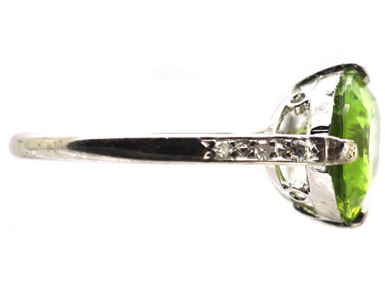 Edwardian Platinum Ring set with a Peridot with Diamond Set Shoulders