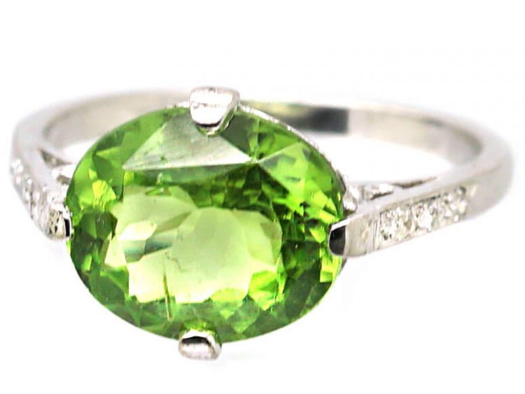 Edwardian Platinum Ring set with a Peridot with Diamond Set Shoulders