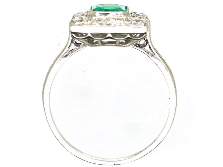 Early 20th Century Platinum Square Ring set with an Emerald & Diamonds