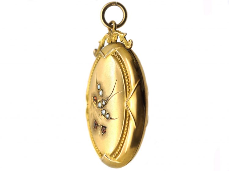 Edwardian 9ct Back & Front Locket with Swallow Motif set with Natural Split Pearls & Garnets