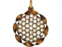 Edwardian 15ct Gold Round Pendant set with Natural Split Pearls with Locket on the Reverse