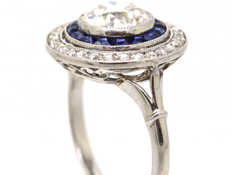 French Early 20th Century Platinum Target Ring set with Diamonds & Sapphires