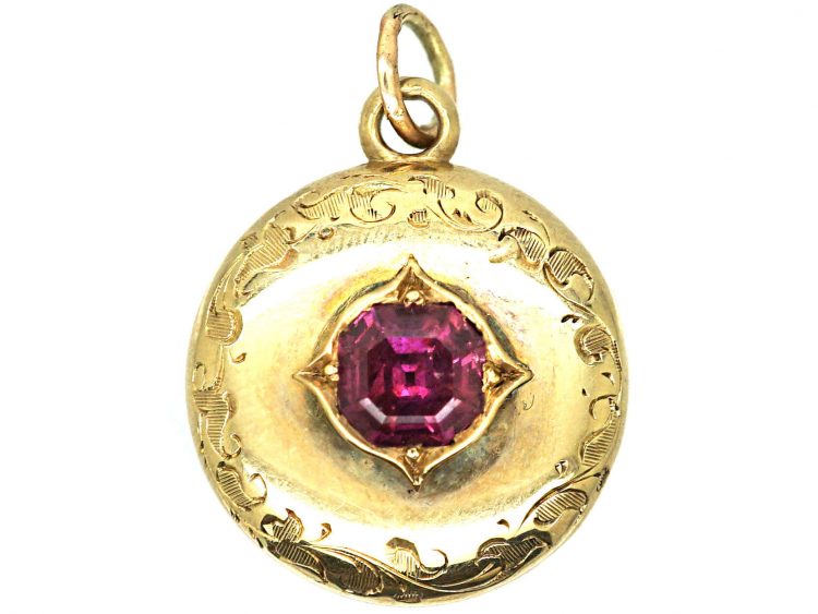 Victorian 15ct Gold Pendant with Locket Back set with an Almandine Garnet