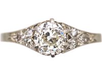 Early 20th Century Platinum, Solitaire Diamond Ring with Diamond set Shoulders