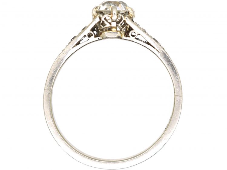 Early 20th Century Platinum, Solitaire Diamond Ring with Diamond set Shoulders