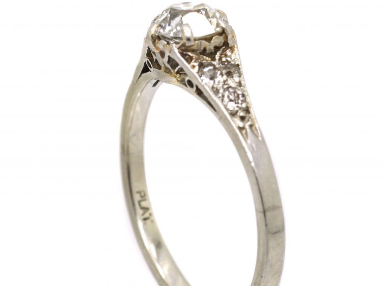 Early 20th Century Platinum, Solitaire Diamond Ring with Diamond set Shoulders