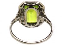 Early 20th Century Platinum Ring set with a Rectangular Cut Peridot & Diamonds