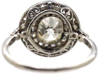 Edwardian Platinum, Diamond Cluster Ring with 1.25 Carat Old Mine Cut Diamond