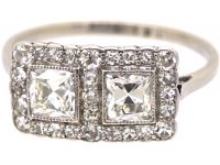 Early 20th Century Platinum Double Square Ring set with Two Princess Cut Diamonds