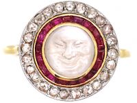 Early 20th Century 18ct Gold & Platinum, Man in the Moon Ring set with a Moonstone, Rose Diamonds & Rubies