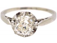 French Early 20th Century Platinum Ring set with an Old Cushion Cut Diamond