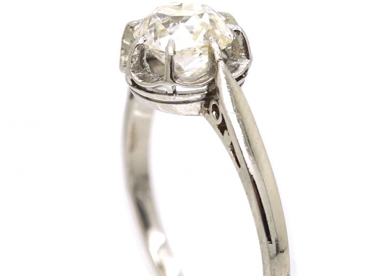 French Early 20th Century Platinum Ring set with an Old Cushion Cut Diamond