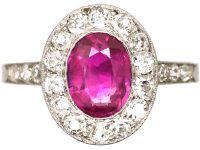 Edwardian Platinum, Ruby & Diamond Cluster Ring with Diamond set Shoulders