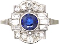 Art Deco Platinum Ring set with a Sapphire & Round & Baguette Cut Diamonds