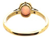 Edwardian 18ct Gold & Platinum Ring set with a Cabochon Opal with Diamond Shoulders