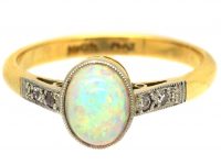 Edwardian 18ct Gold & Platinum Ring set with a Cabochon Opal with Diamond Shoulders