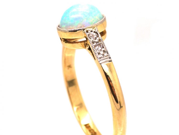Edwardian 18ct Gold & Platinum Ring set with a Cabochon Opal with Diamond Shoulders