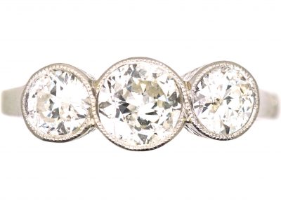 Edwardian Platinum, Three Stone Diamond Rub Over set Ring