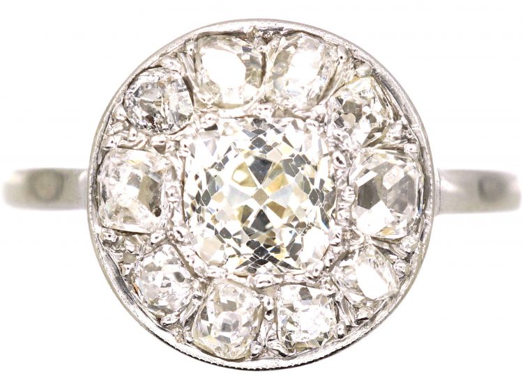 Early Twentieth Century French Platinum Old Mine Cut Diamond Cluster Ring