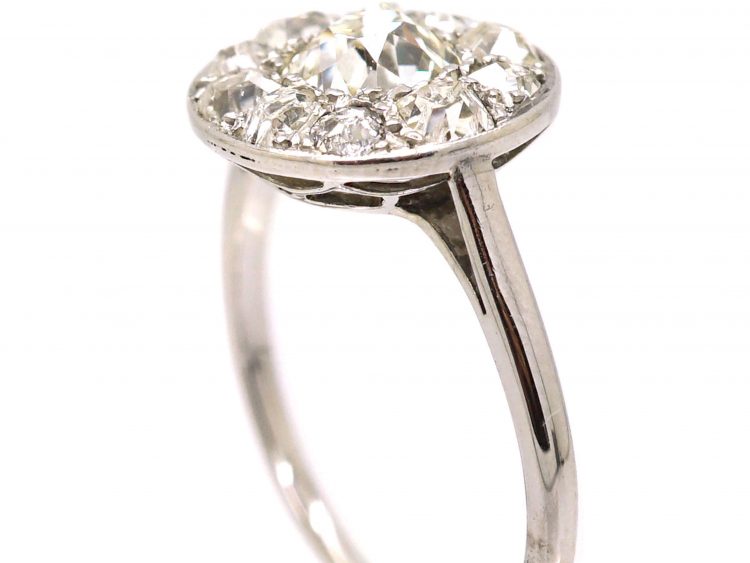 Early Twentieth Century French Platinum Old Mine Cut Diamond Cluster Ring