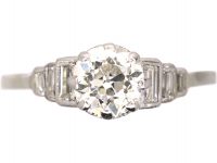 Art Deco Platinum Diamond Solitaire Ring with Step Cut Shoulders set with Baguette Diamonds