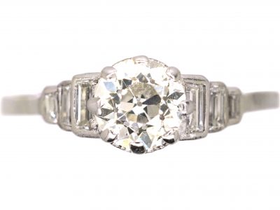 Art Deco Platinum Diamond Solitaire Ring with Step Cut Shoulders set with Baguette Diamonds