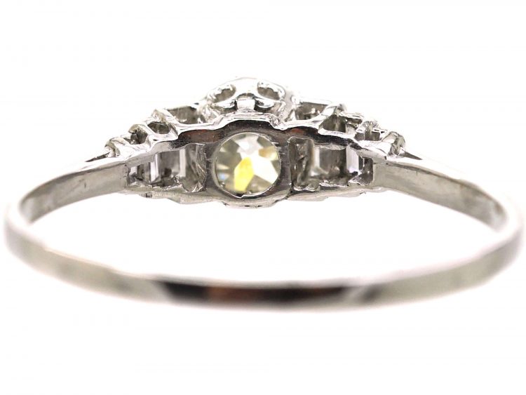 Art Deco Platinum Diamond Solitaire Ring with Step Cut Shoulders set with Baguette Diamonds