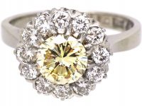 18ct White Gold Cluster Ring set with a Fancy Light Yellow Diamond