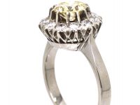 18ct White Gold Cluster Ring set with a Fancy Light Yellow Diamond