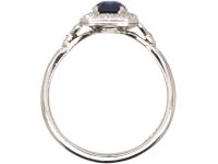 Platinum Diamond Cluster Ring Set With An Emerald Cut Sapphire