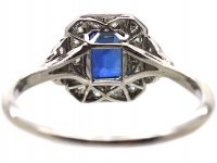 Platinum Diamond Cluster Ring Set With An Emerald Cut Sapphire