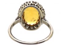 Early 20th Century Platinum Yellow Sapphire & Diamond Oval Cluster Ring