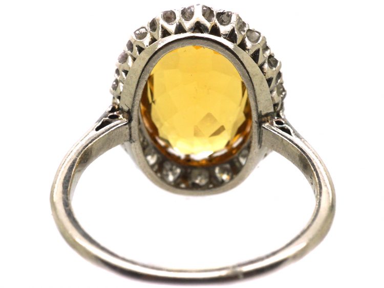Early 20th Century Platinum Yellow Sapphire & Diamond Oval Cluster Ring