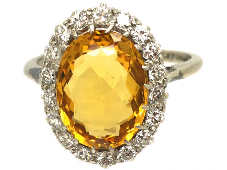 Early 20th Century Platinum Yellow Sapphire & Diamond Oval Cluster Ring