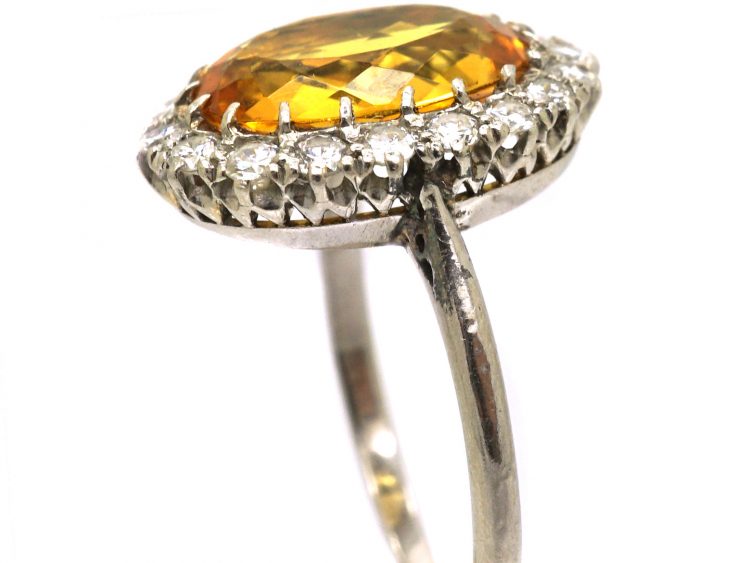 Early 20th Century Platinum Yellow Sapphire & Diamond Oval Cluster Ring