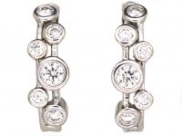 18ct White Gold Raindance Style Hoop Earrings set with Diamonds 18ct White Gold Raindance Style Hoop Earrings set with Diamonds