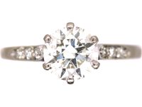 Early 20th Century Platinum, Diamond Solitaire Ring with Diamond Set Shoulders
