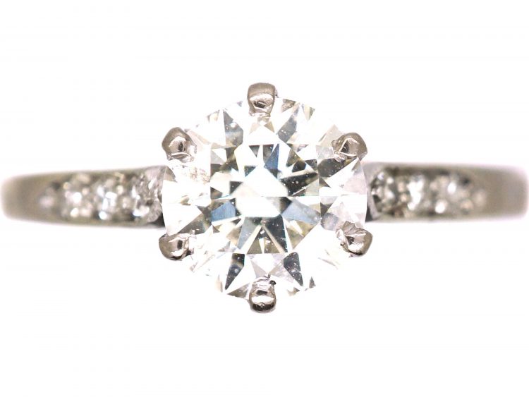 Early 20th Century Platinum, Diamond Solitaire Ring with Diamond Set Shoulders