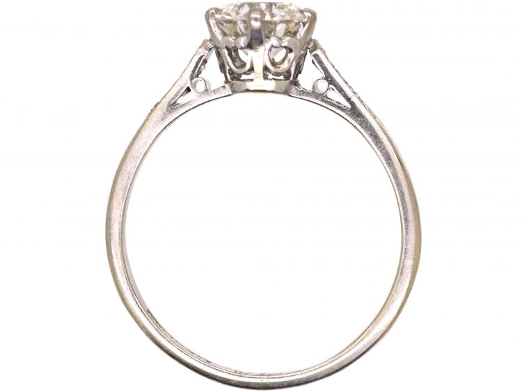 Early 20th Century Platinum, Diamond Solitaire Ring with Diamond Set Shoulders