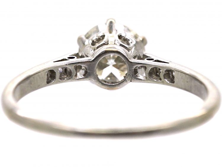 Early 20th Century Platinum, Diamond Solitaire Ring with Diamond Set Shoulders