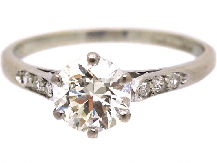 Early 20th Century Platinum, Diamond Solitaire Ring with Diamond Set Shoulders
