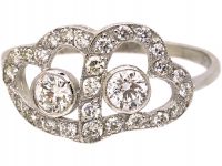 Mid 20th Century Platinum Intertwined Hearts Ring set with Diamonds