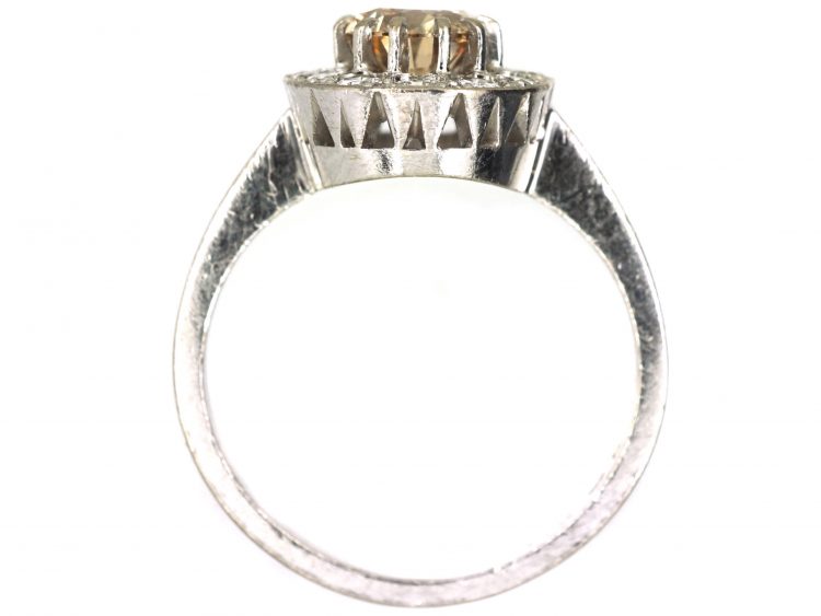 Mid 20th Century 18ct Gold Cluster Ring set with a Cognac Diamond within an Oval Ring of Diamonds