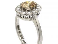 Mid 20th Century 18ct Gold Cluster Ring set with a Cognac Diamond within an Oval Ring of Diamonds