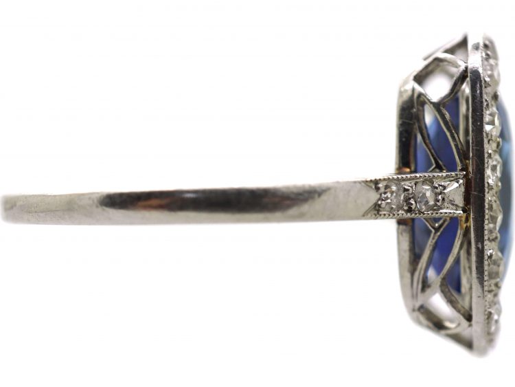 Early 20th Century Platinum Ring set with a Large Ceylon Sapphire & Diamonds