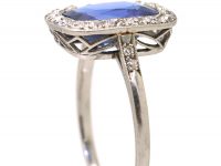 Early 20th Century Platinum Ring set with a Large Ceylon Sapphire & Diamonds