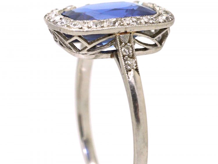 Early 20th Century Platinum Ring set with a Large Ceylon Sapphire & Diamonds