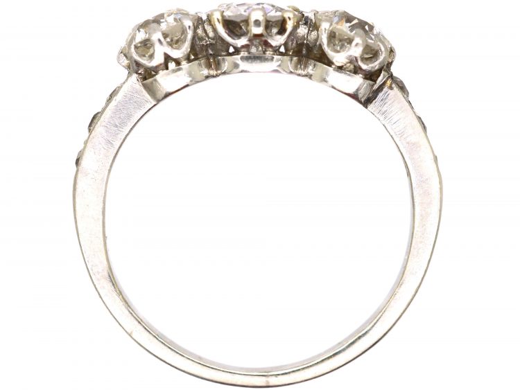 Early 20th Century Platinum, Three Stone Diamond Ring with Diamond set Shoulders