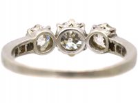 Early 20th Century Platinum, Three Stone Diamond Ring with Diamond set Shoulders