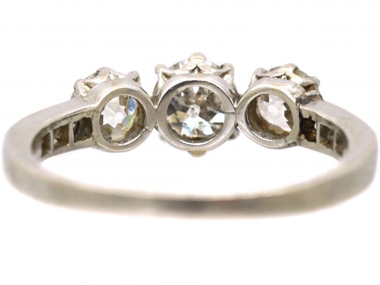Early 20th Century Platinum, Three Stone Diamond Ring with Diamond set Shoulders
